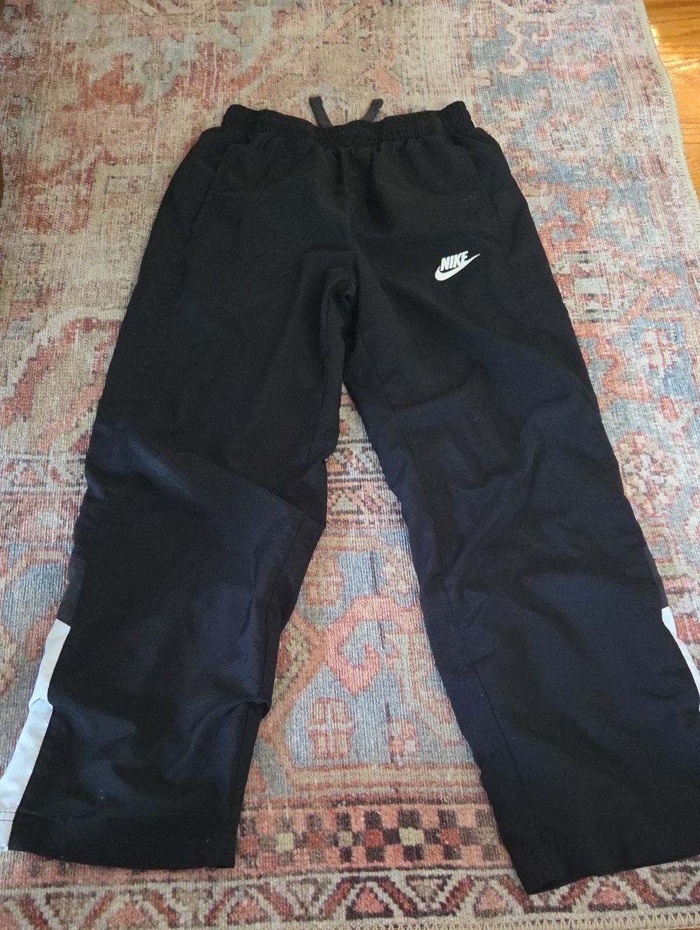 Nike Black Kids Wind Pants with White Swoosh